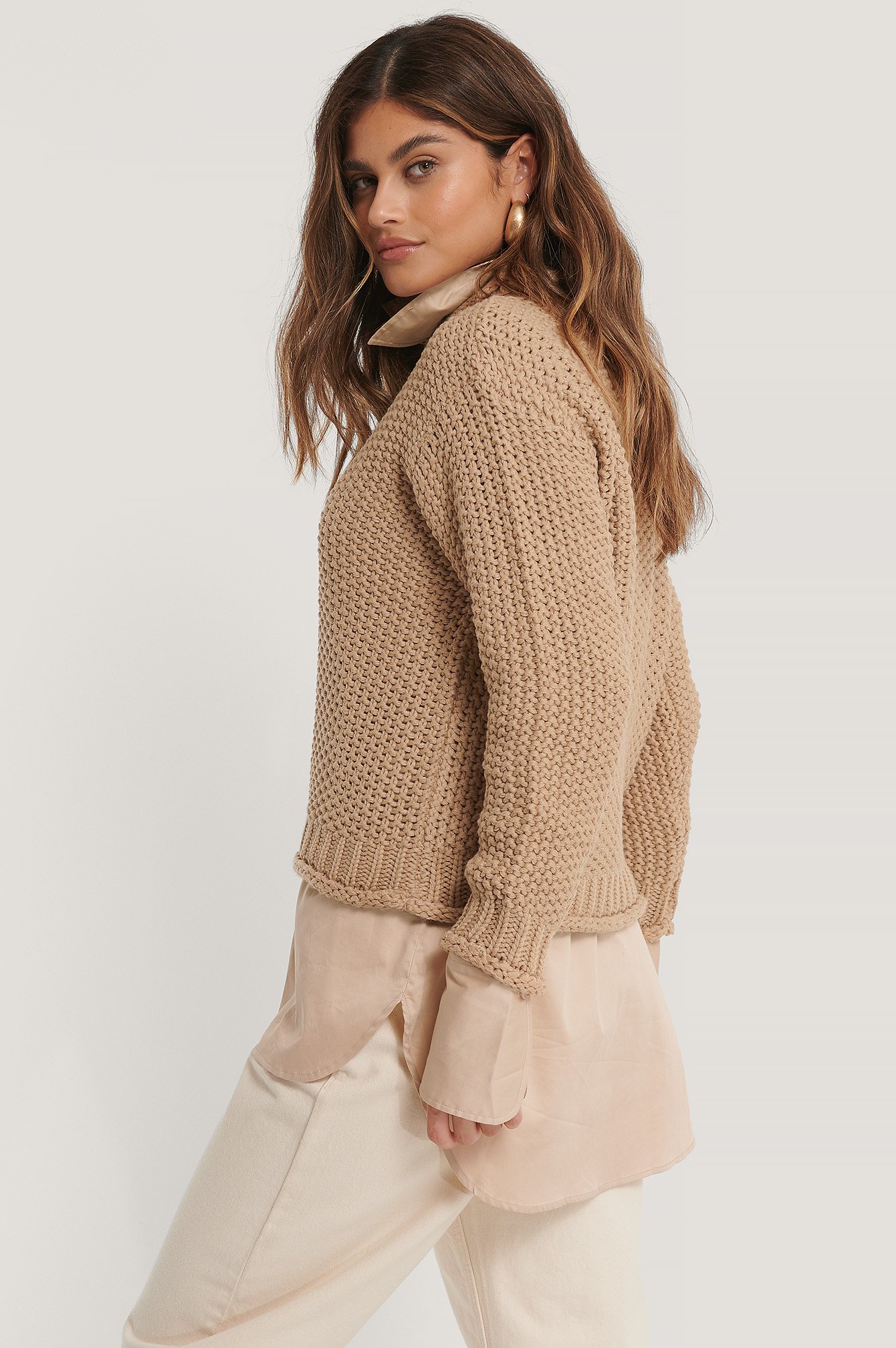 hoe heet een trui met een hoge kraag