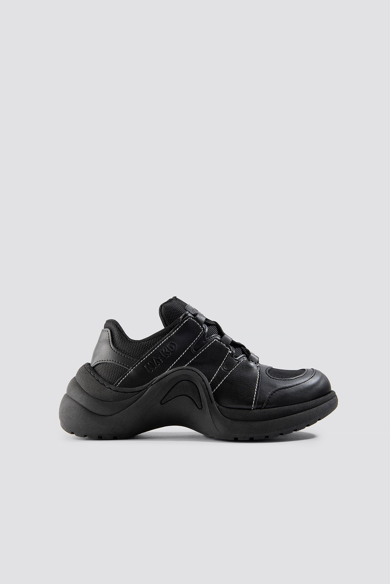 black white sole trainers