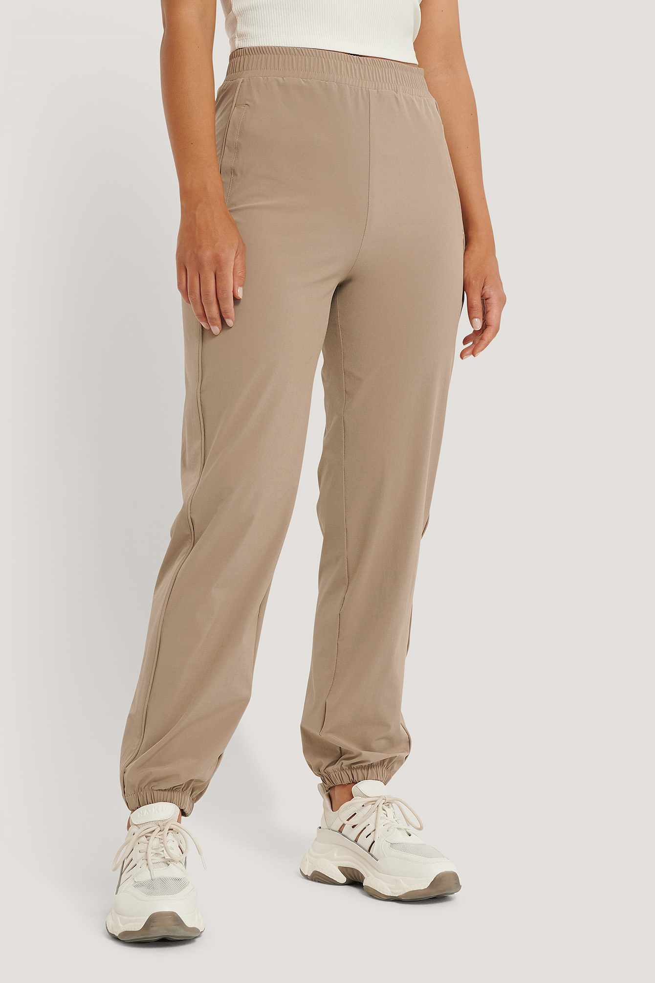Windbreaker Pants Beige | na-kd.com