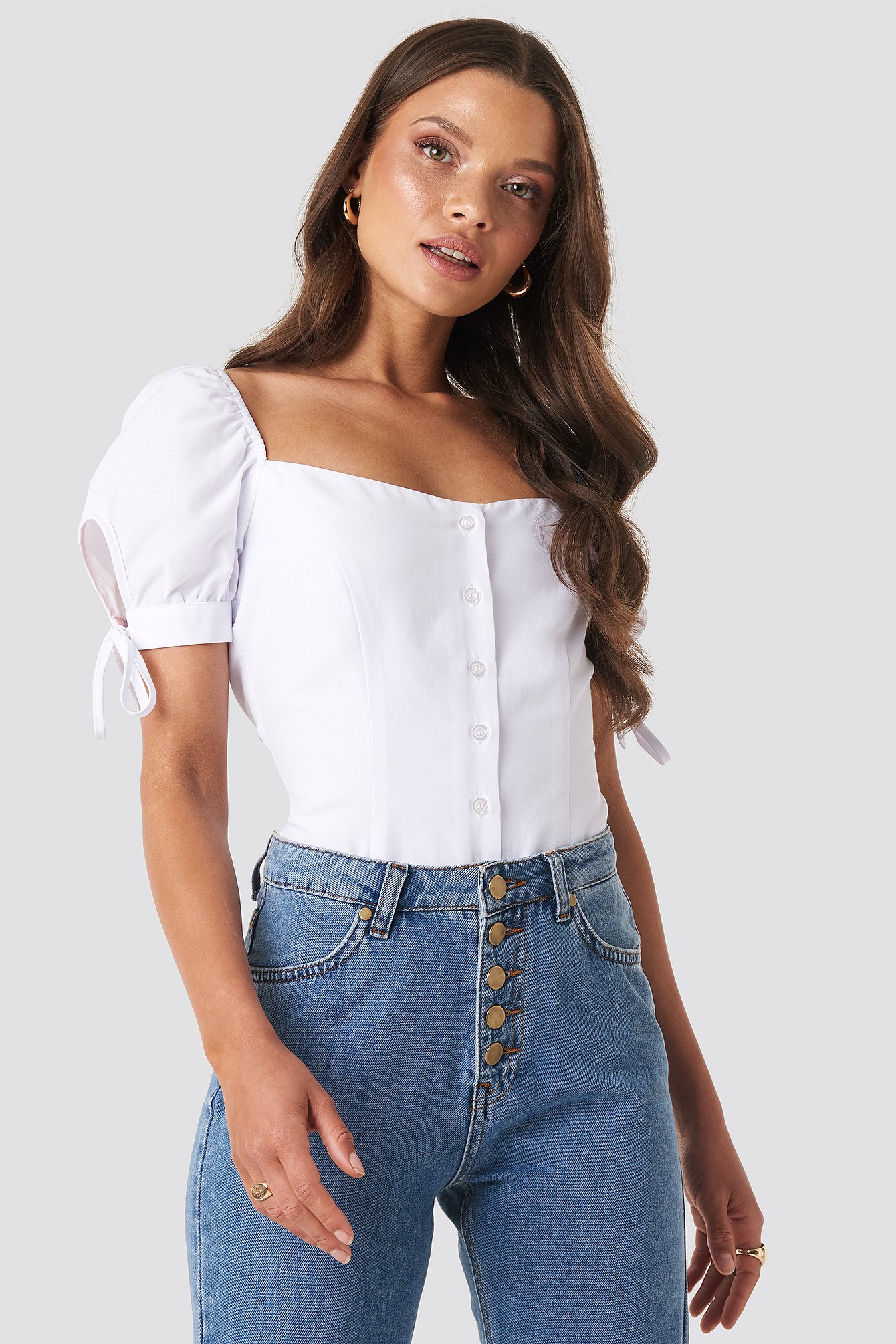 white shoulderless blouse