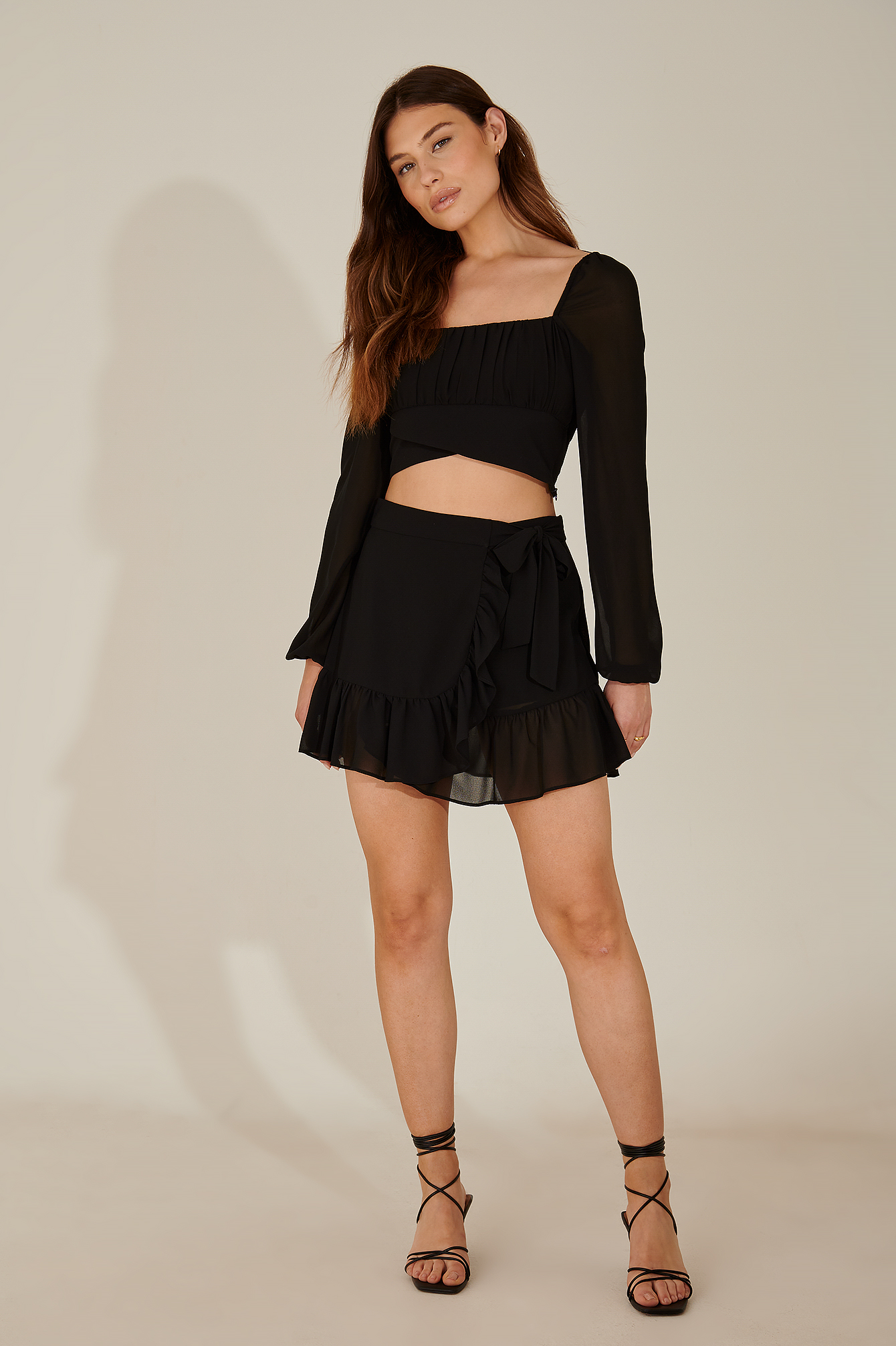 Asymmetric frill mini skirt
