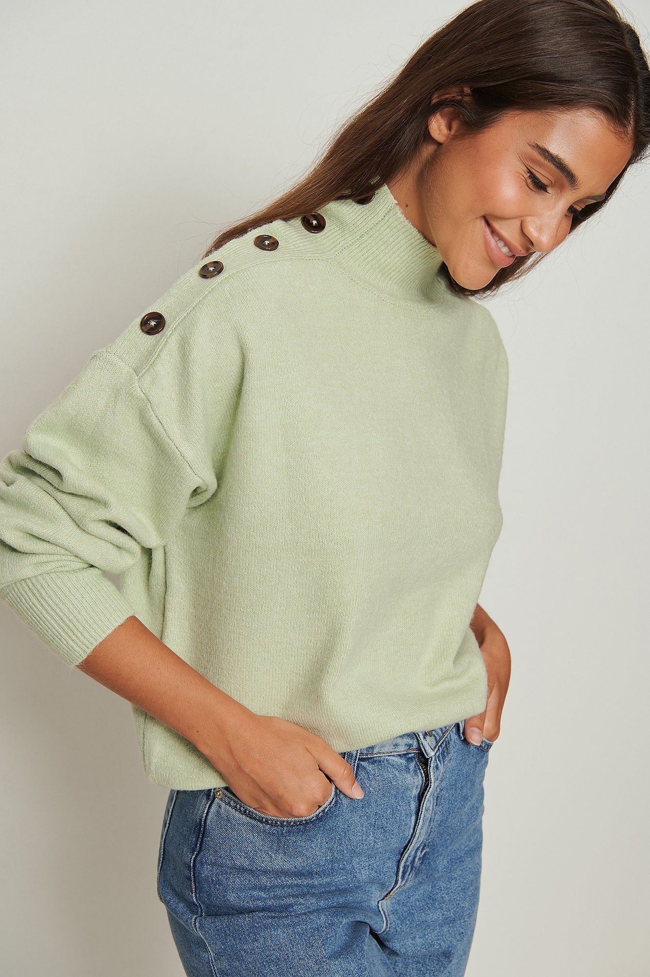Mint Sweater met knoopdetail