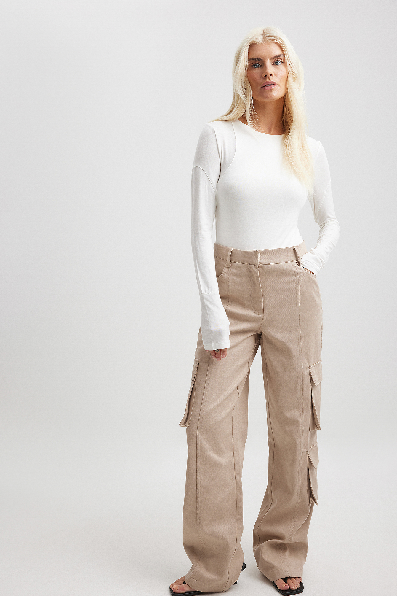 High-rise wide-leg cargo pants in beige - Valentino | Mytheresa