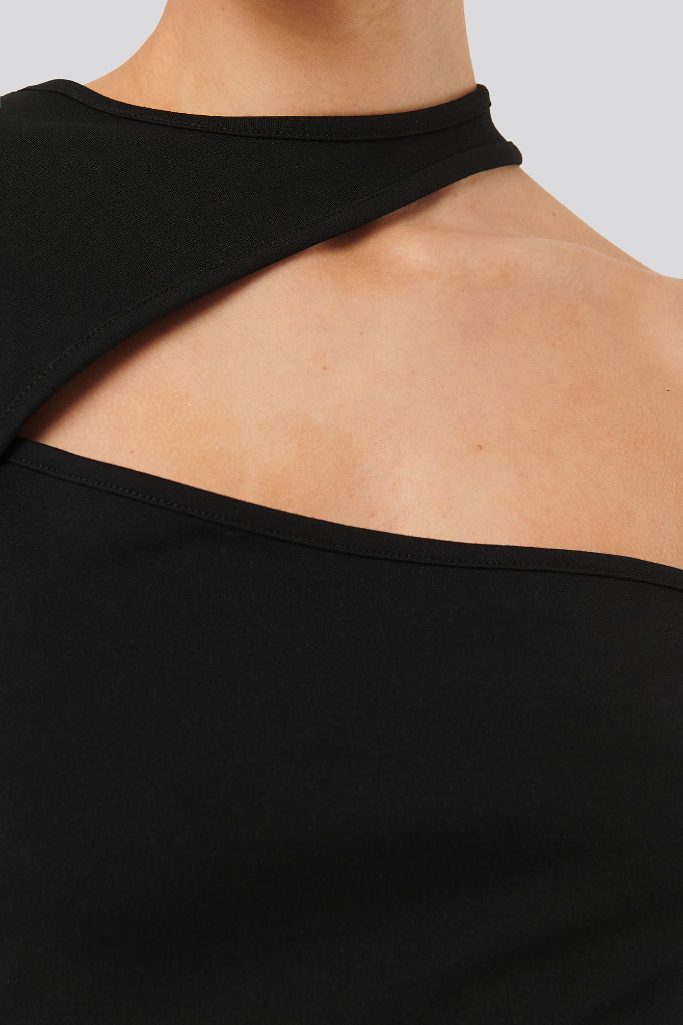 SARA SIEPPI X NA-KD ONE SLEEVE CUT OUT JERSEY TOP - BLACK