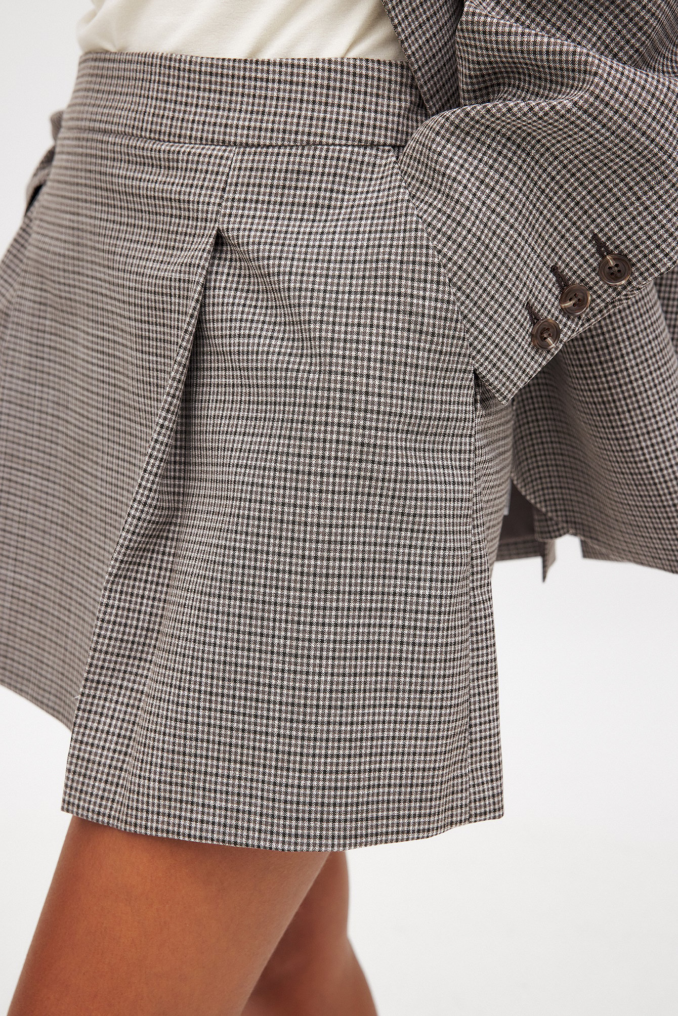 Check pleated mini skirt