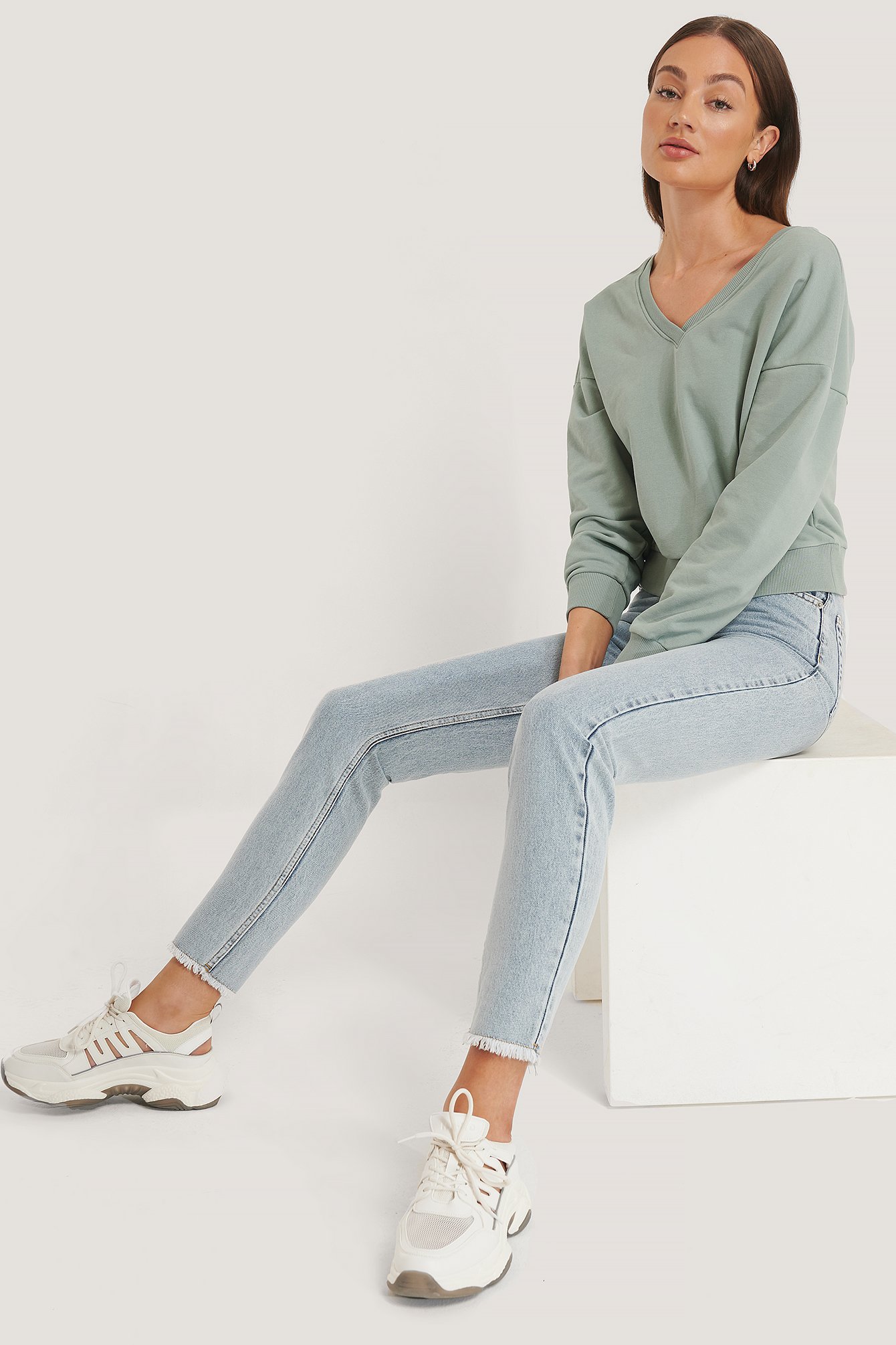 V-Neck Sweatshirt Outfit