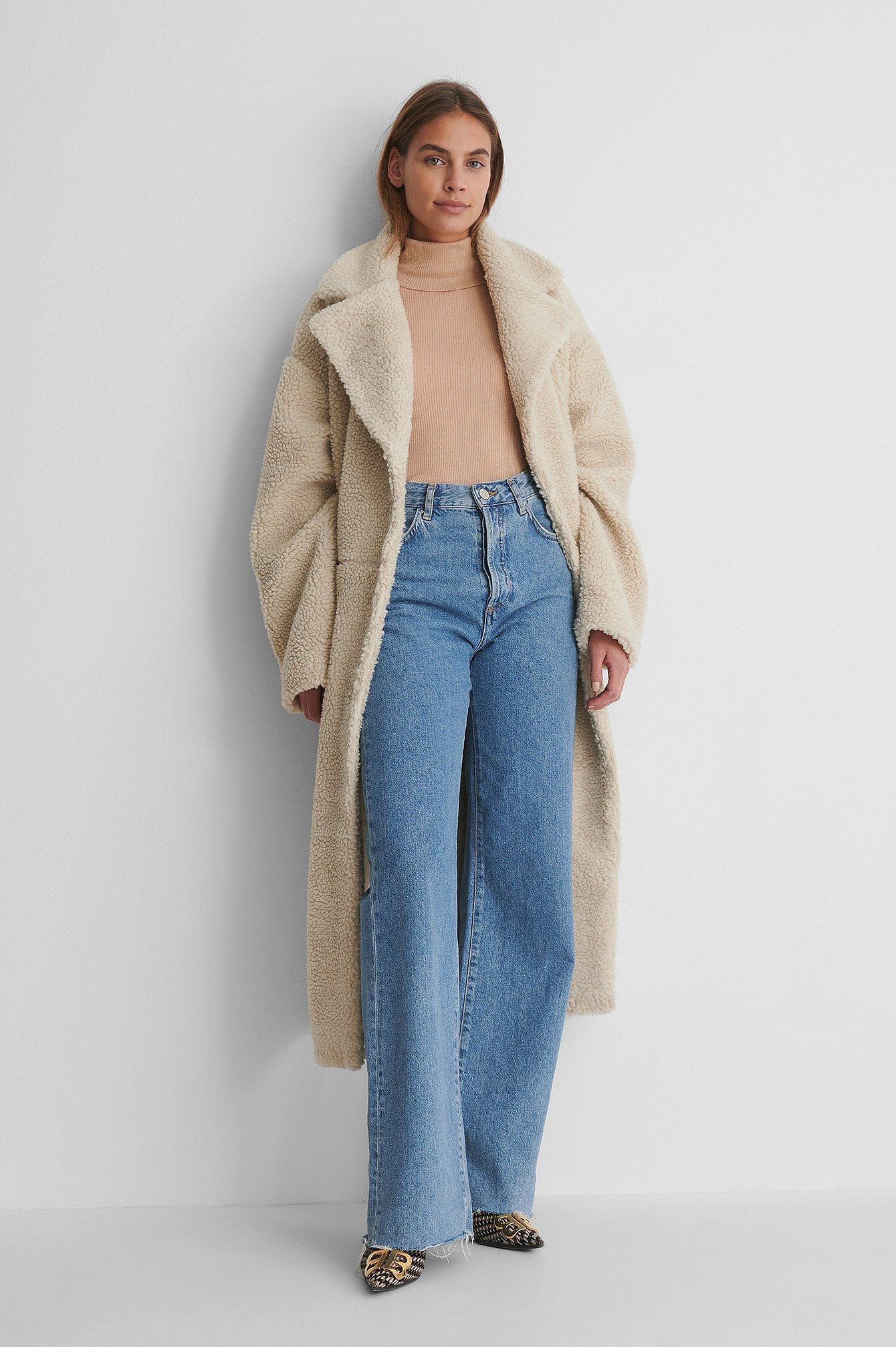 Pure Wool High Neck Knitted Sweater with Wide Denim and a Teddy Coat.