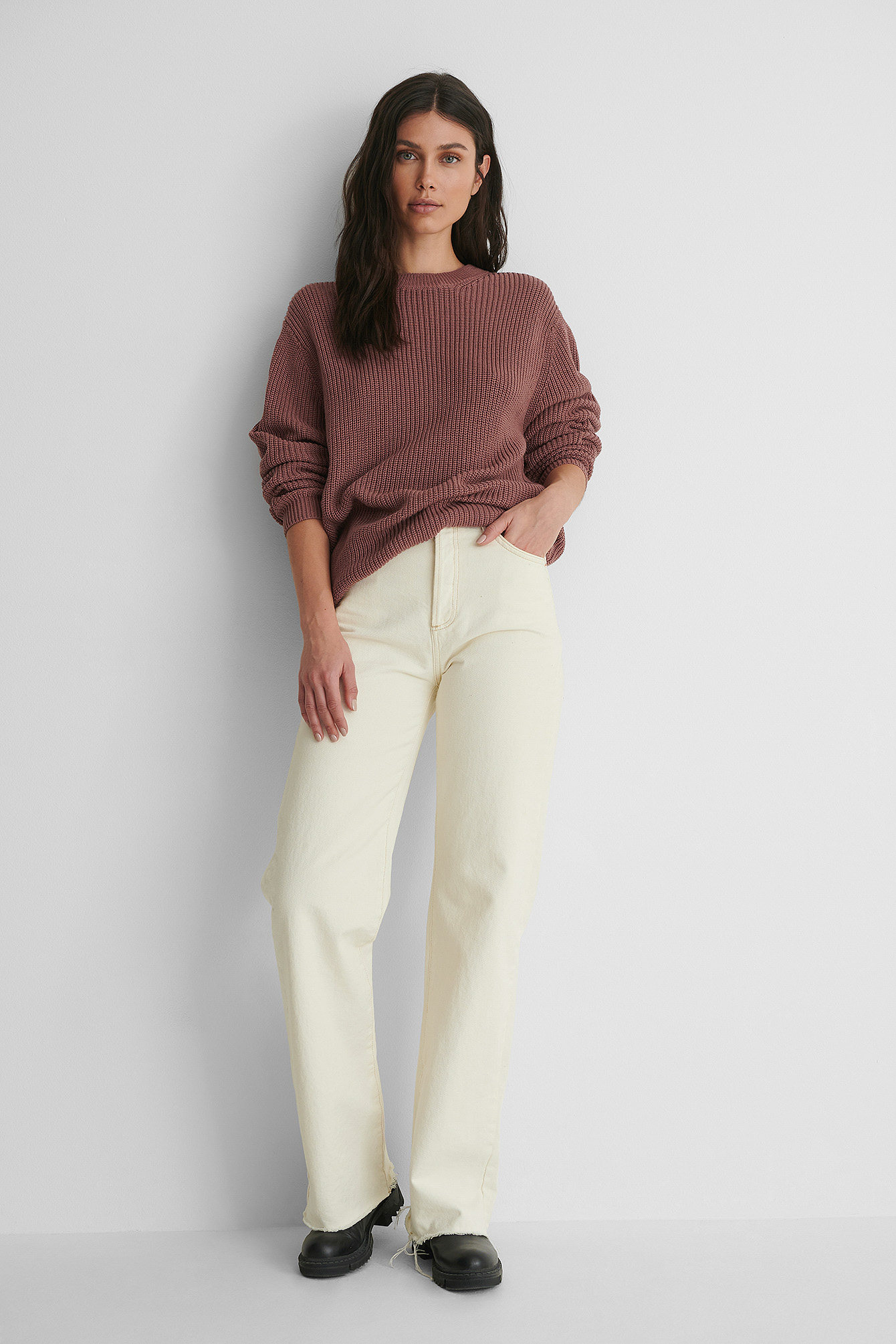 Round Neck Knitted Sweater with Offwhite Jeans.