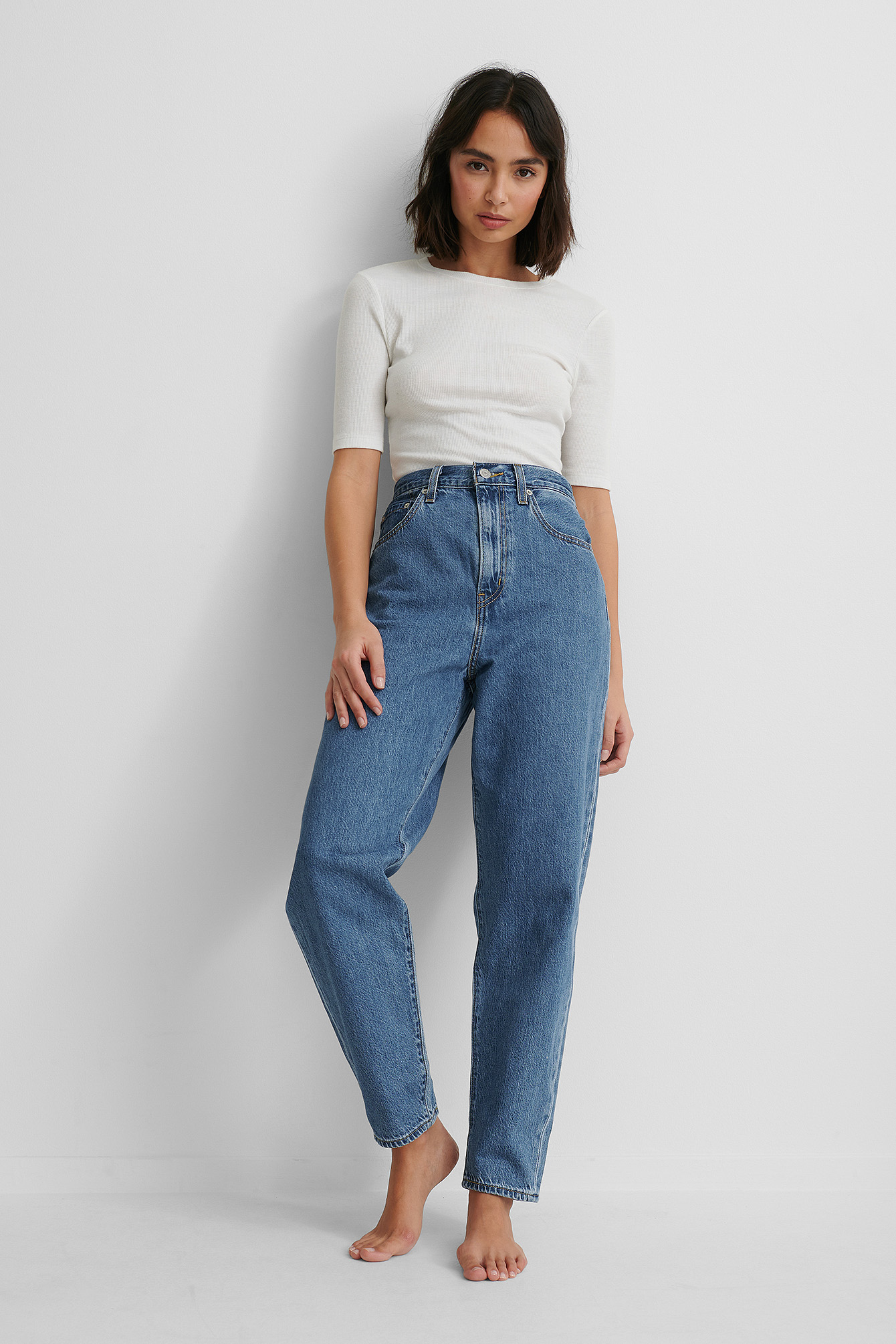 Levis High Loose Taper Jeans with White Top.
