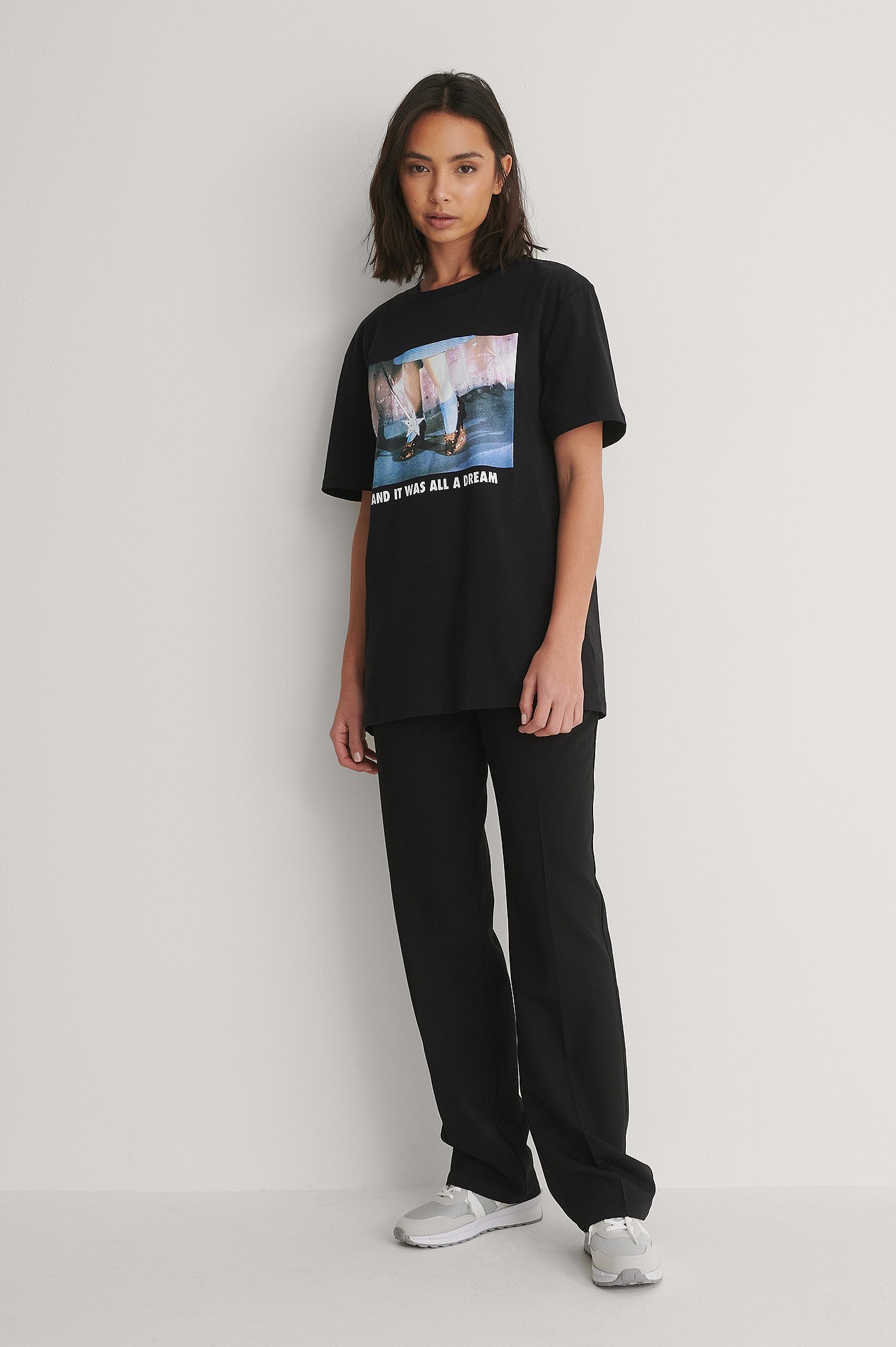 Unisex Tee and Black Suit Pants Outfit.