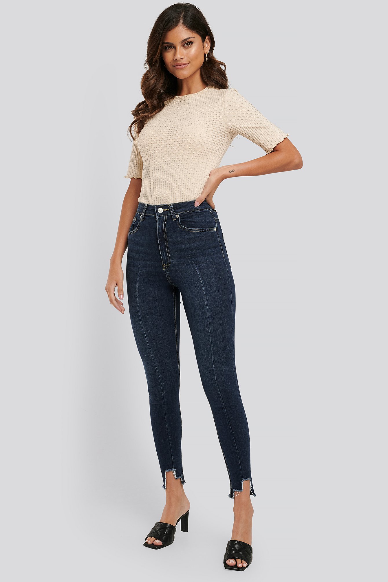 Super High Waist Asymmetrical Hem Jeans 