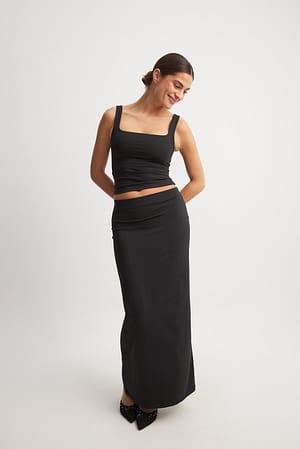 Black Figurföljande kjol med lågmidja