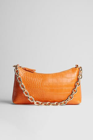 Orange Baguette-väska med kedja och krokodilmönster