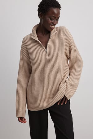 Beige High Neck Zipped Knitted Sweater