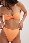 Orange Bikinitruse med høy skjæring