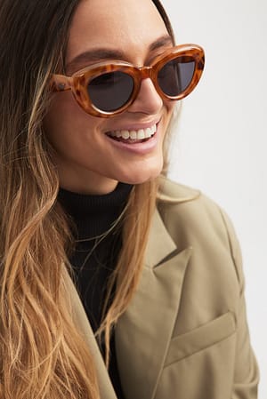 Amber Aufgeblasene Cateye-Sonnenbrille