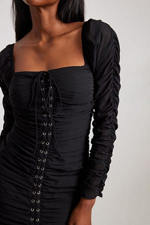 Black Vestido mini con encaje en la parte frontal