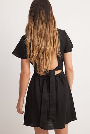 Black Linnen flowy mini-jurk met strik op de rug
