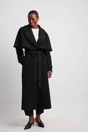 Black Lang frakke med frynsedetalje