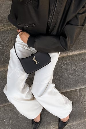 Offwhite Jeans med løstsiddende pasform, mellemhøj talje og sømdetaljer