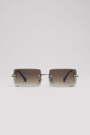Beige Sonnenbrille mit schmalen, quadratischen Gläsern