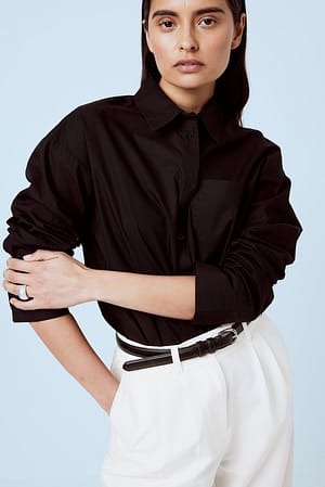 Black Camisa oversize de algodón con bolsillo