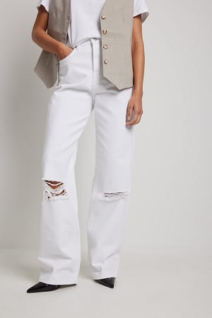White Jeans strappati con gamba ampia e lavaggio acido