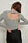Pull tricoté côtelé avec détail dans le dos