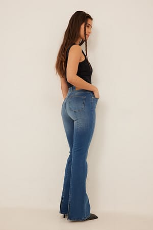 Mid Blue Smala jeans med slits bak