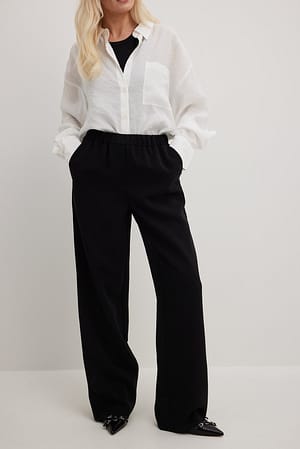 Black Pantalones de pernera ancha con cintura elástica
