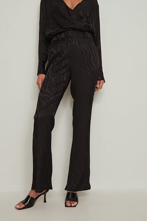 Black Jacquard slitt bukse med sebramønster
