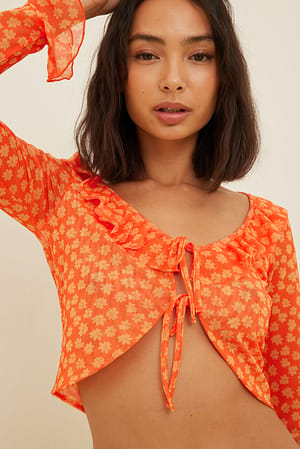 Orange flower Bedruckte Bluse mit Rüschendetail