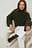 Dzianinowy sweter z wysokim kołnierzem i szerokimi rękawami
