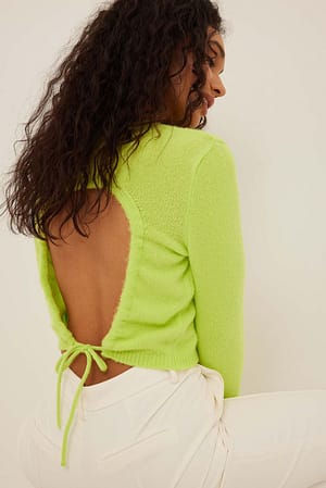 Lime Stickad tröja med öppen detalj i ryggen