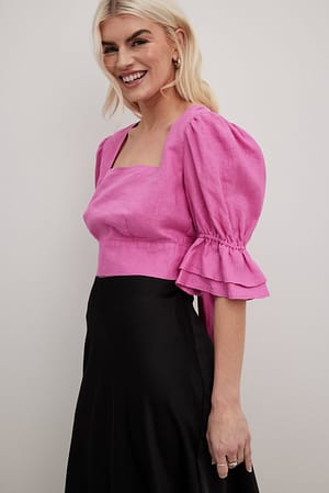 Pink Top con anudado en espalda hecho de material de lino