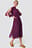 Siateczkowa sukienka z rozciętym rękawem
