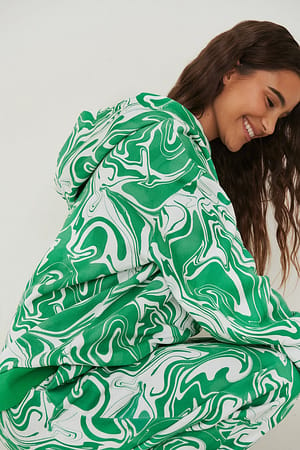 Green Swirl Print Camisola com capuz oversize com estampado orgânico
