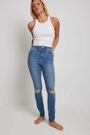 Versleten skinny jeans met hoge taille Blauw NA-KD