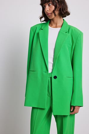Green Blazer oversize con spalle appuntite in tessuto riciclato