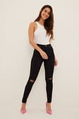 Black Skinny Jeans mit hoher Taille Used-Look