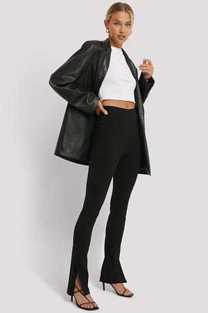 Black Pantalones superelásticos slim fit con apertura