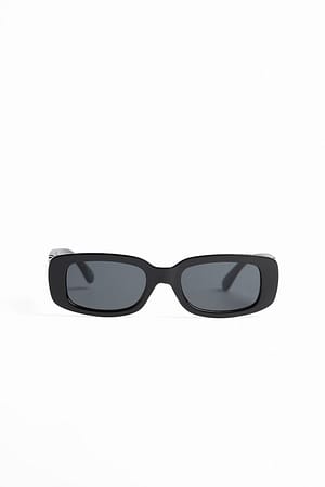 Black Retro solbriller med smalt stel