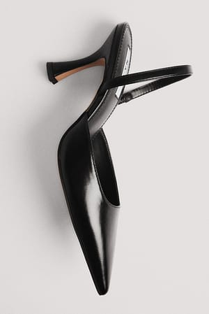 Black Slingback-pumps med tynne timeglassformede hæler
