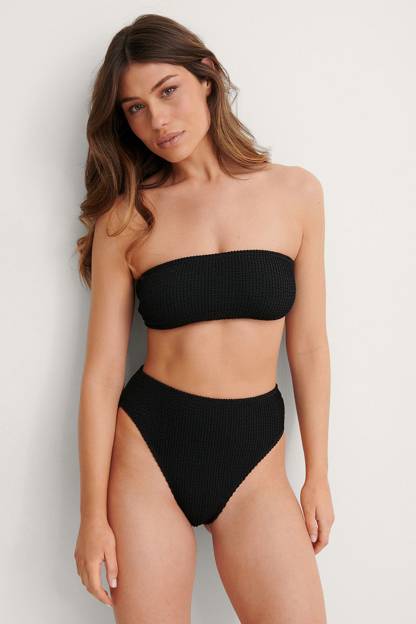 Black smocked high waisted high leg bikini pant.
