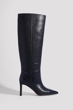Black Spetsiga boots i läder med lössittande skaft