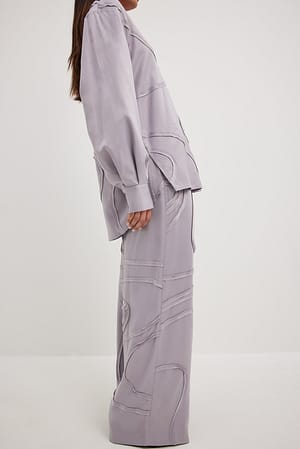 Grey Pantalón con costuras onduladas
