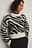 Kort strikket sweater i overstørrelse med zebramønster