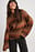 Oversized strikket genser med ombremønster