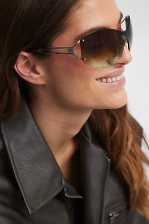 Brown Oval Frameless Sunglasses