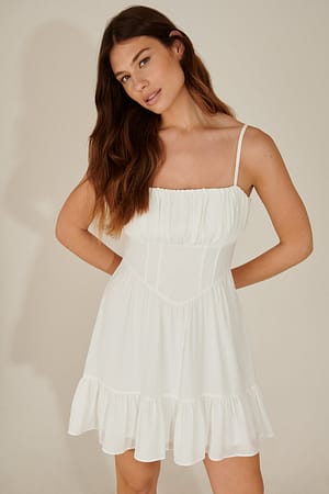 White Vestido mini em tecido reciclado com folhos